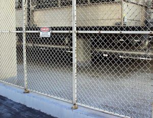 woven wire mesh security fence protecting ac unit